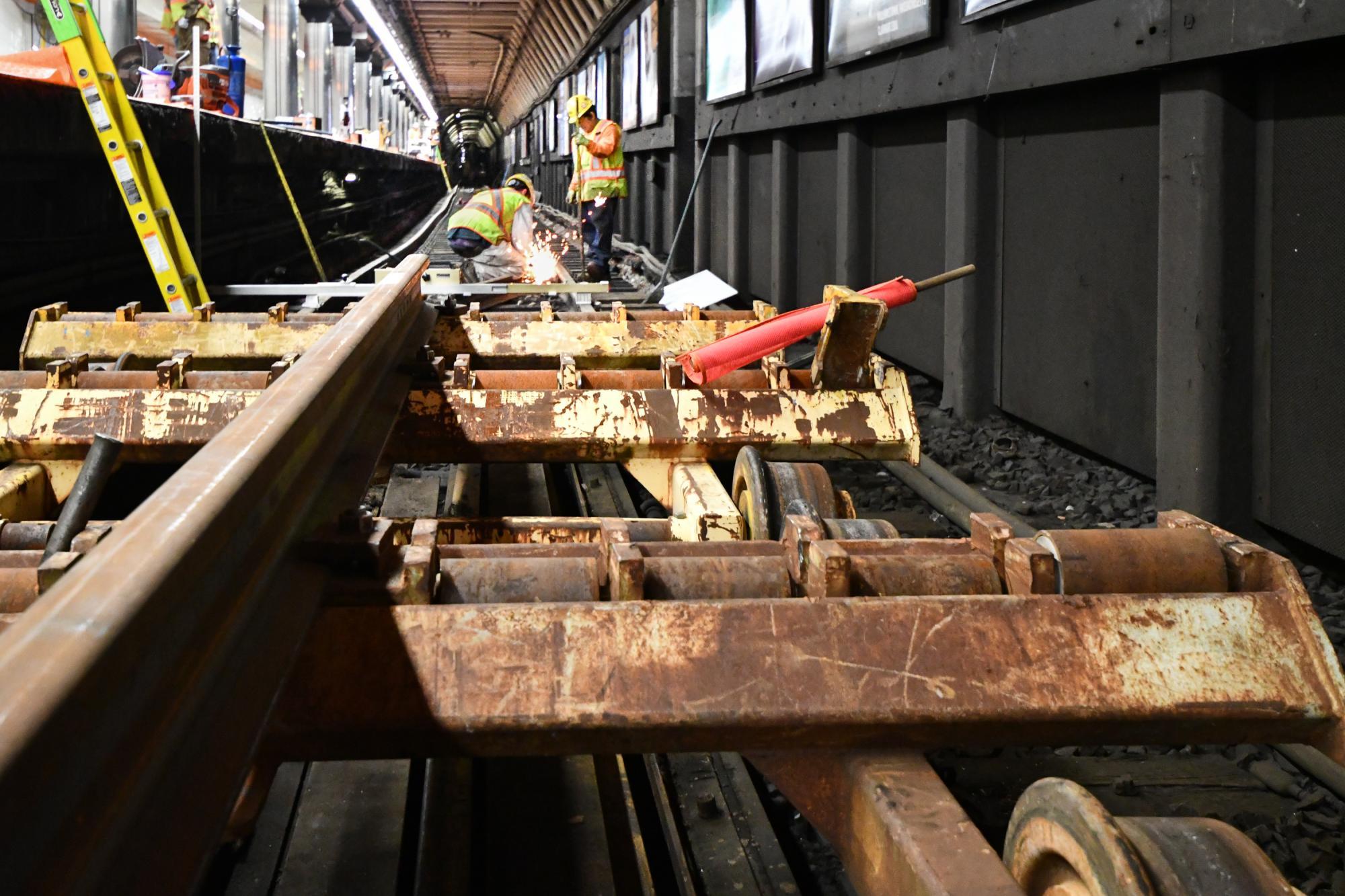 A crew works on track replacement at Downtown Crossing during the October  4 - 6, 2019, weekend shutdown.
