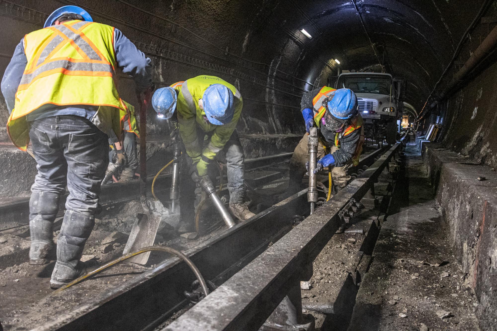 Crew members replace floating slabs at Porter during the January 24–26, 2020, Red Line weekend shutdown