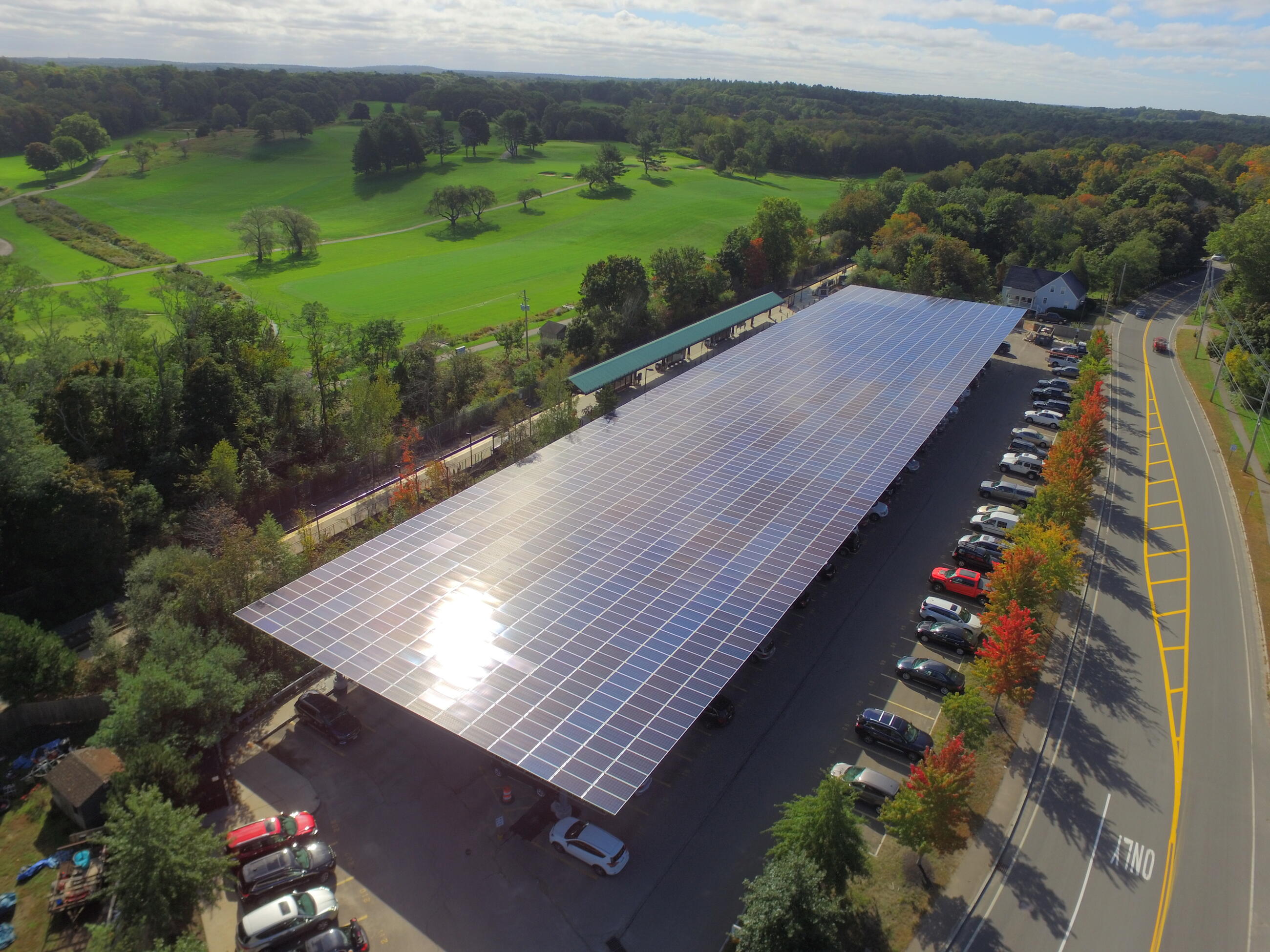 Aerial view of the T's solar canopy covering a parking lot in West Hingham. 