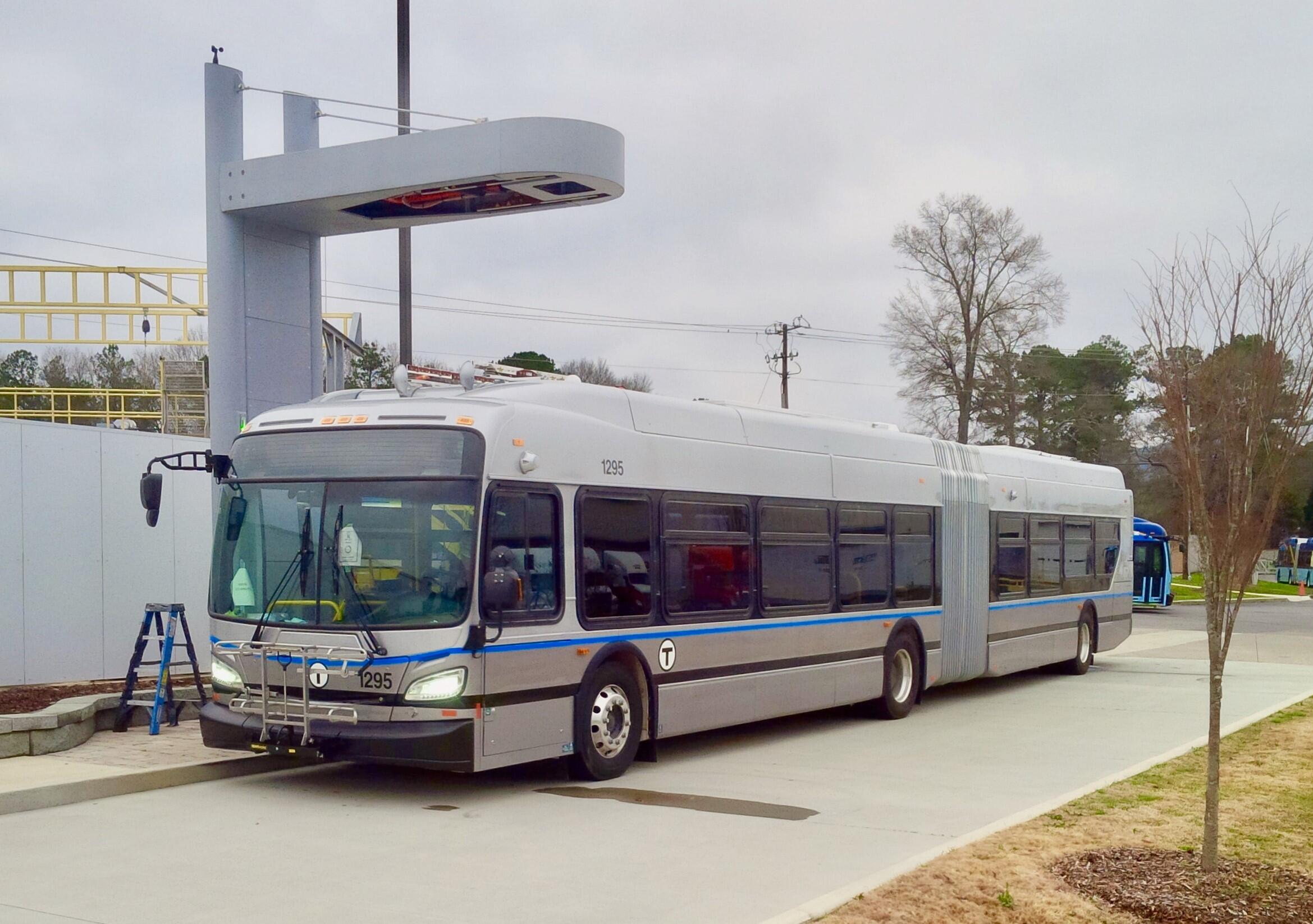 A Silver Line Battery Electric Bus (BEB) with an example of en-route charging equipment.