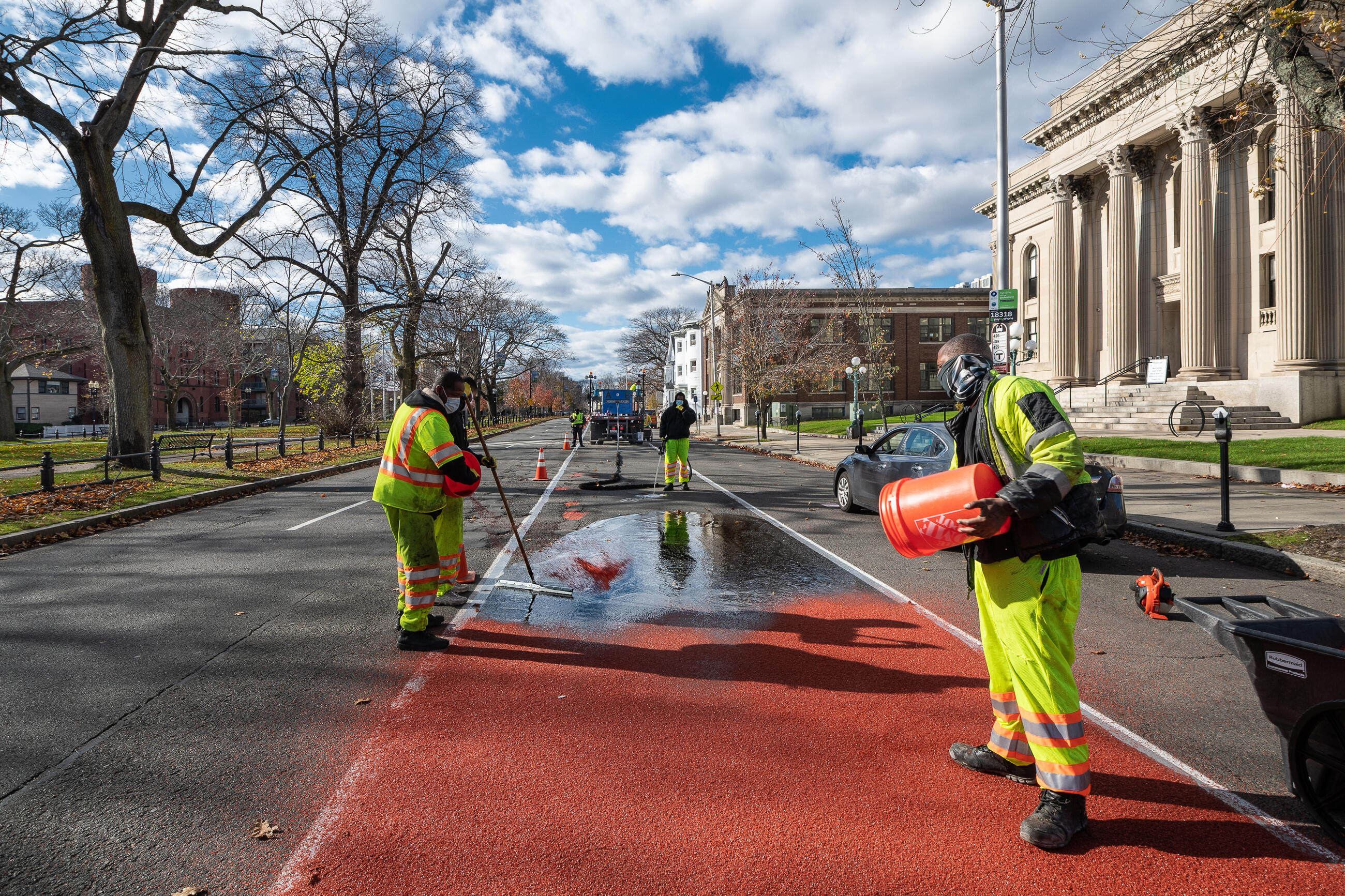 Construction crews installing a segment of the bus lane on North Common Street near the Lynn Public Library in November 2020.