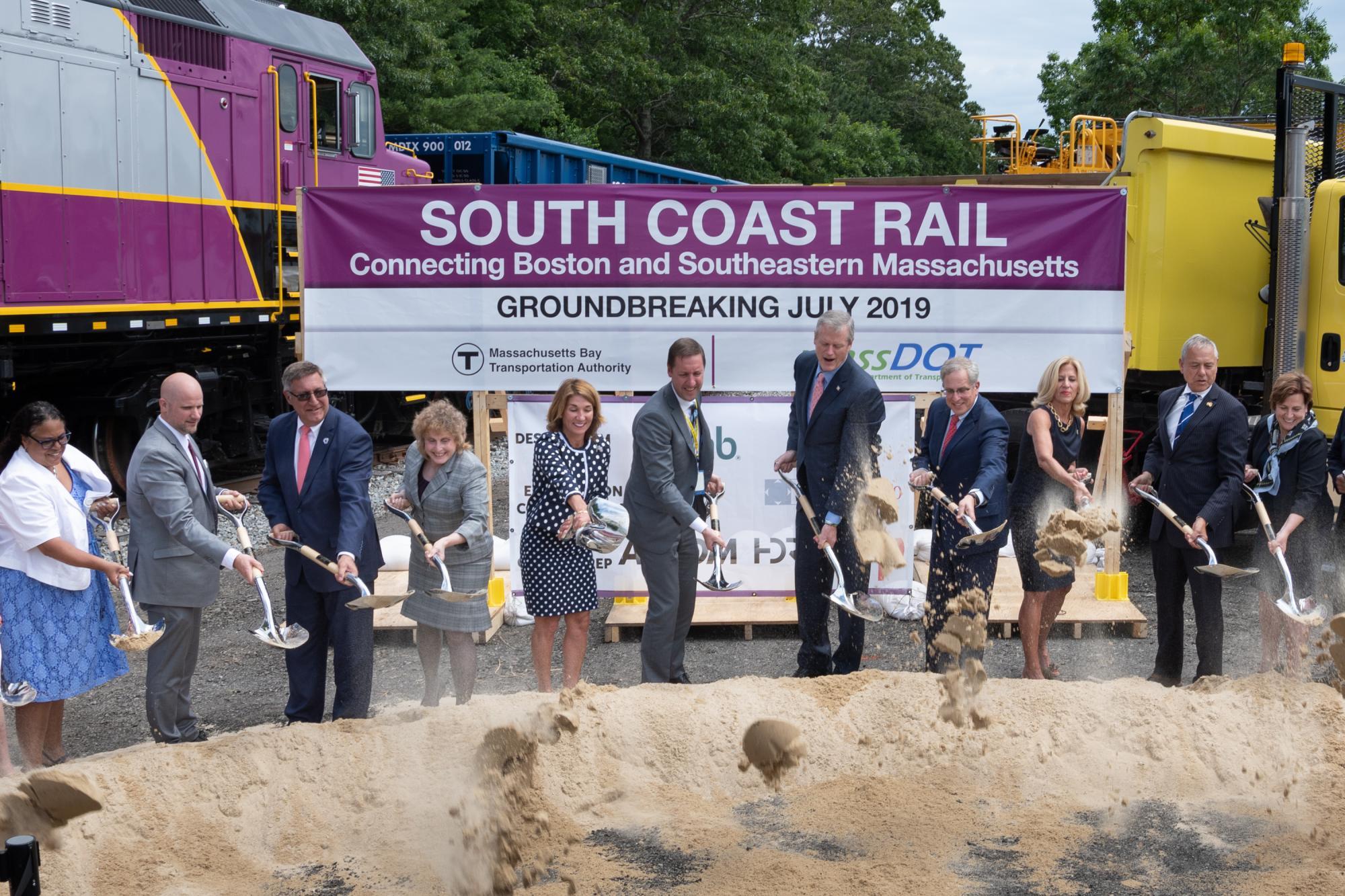 Officials with shovels at the groundbreaking of South Coast Rail
