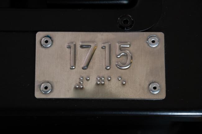 bus number in raised letters and braille